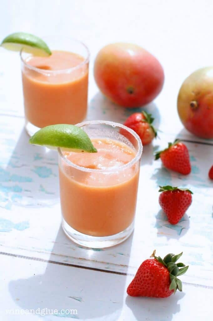 This frozen strawberry mango margarita is one of over 30 refreshing margarita recipes in a collection on afamilyfeast.com