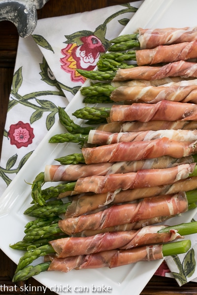 Prosciutto Wrapped Asparagus - One of over 30 Amazing Asparagus Recipes to give you cooking inspiration this Spring! See the collection on A Family Feast 