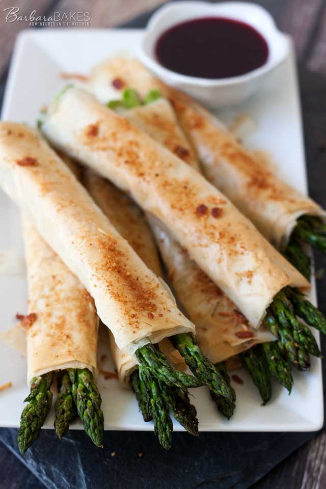 Asparagus Wrapped with Parmesan, Bacon, and Phyllo - One of over 30 Amazing Asparagus Recipes to give you cooking inspiration this Spring! See the collection on A Family Feast