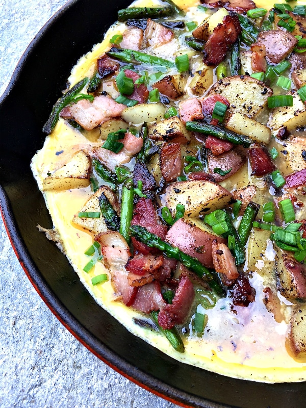 Bacon Asparagus Potato Frittata - One of over 30 Amazing Asparagus Recipes to give you cooking inspiration this Spring! See the collection on A Family Feast