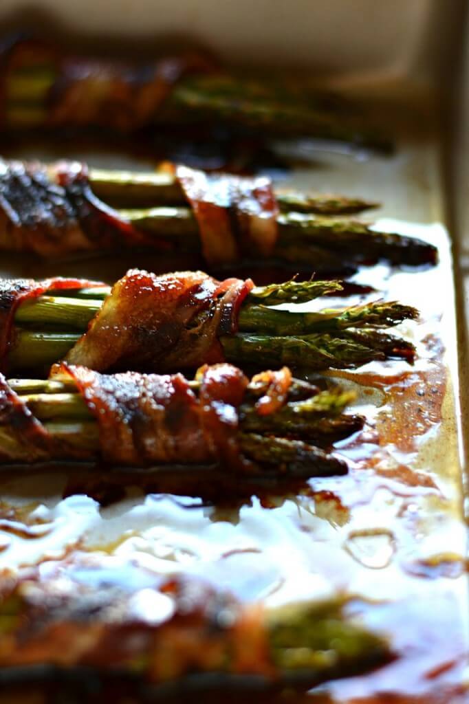 Bacon Wrapped Asparagus - One of over 30 Amazing Asparagus Recipes to give you cooking inspiration this Spring! See the collection on A Family Feast