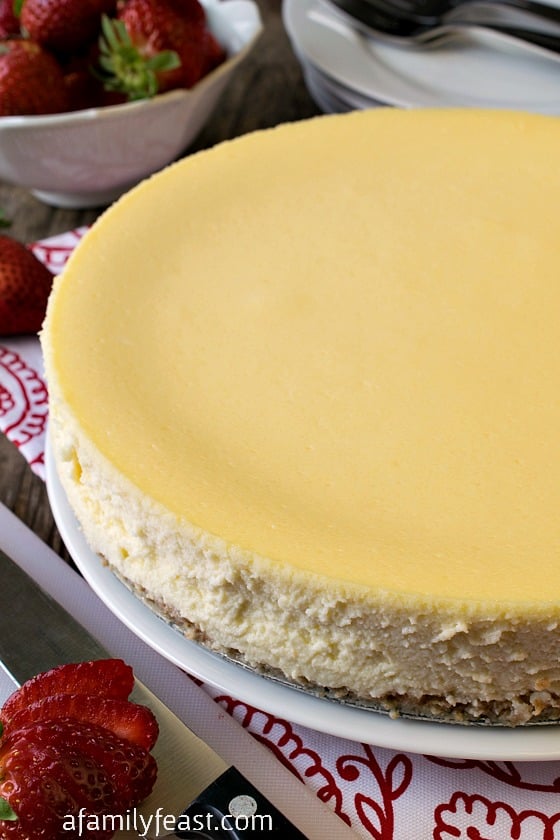 The best Classic Cheesecake recipe with a sweet graham cracker crust and incredibly rich filling with a hint of vanilla and lemon. Amazing!