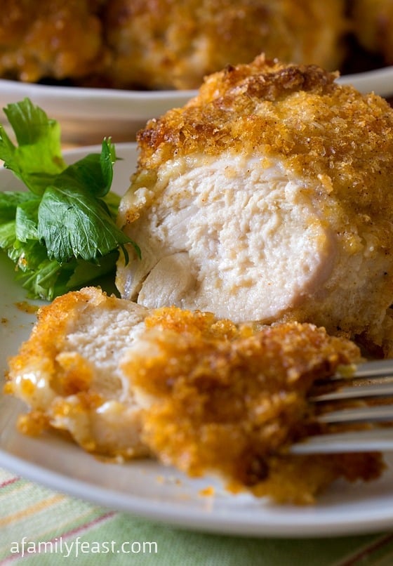 Golden Crusted Baked Chicken - Tender juicy baked chicken with a light, golden crust. Your family will love this recipe!