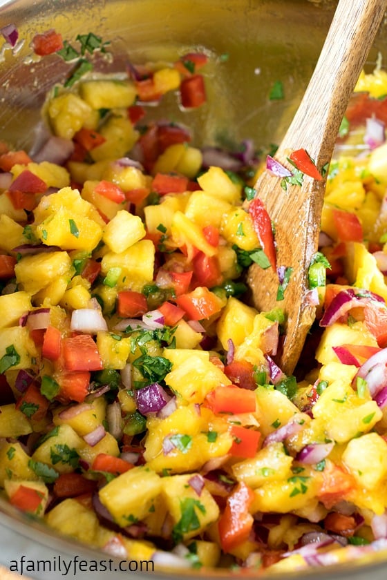 Pineapple Mango Salsa - Easy to make and super delicious! You'll make this recipe again and again!