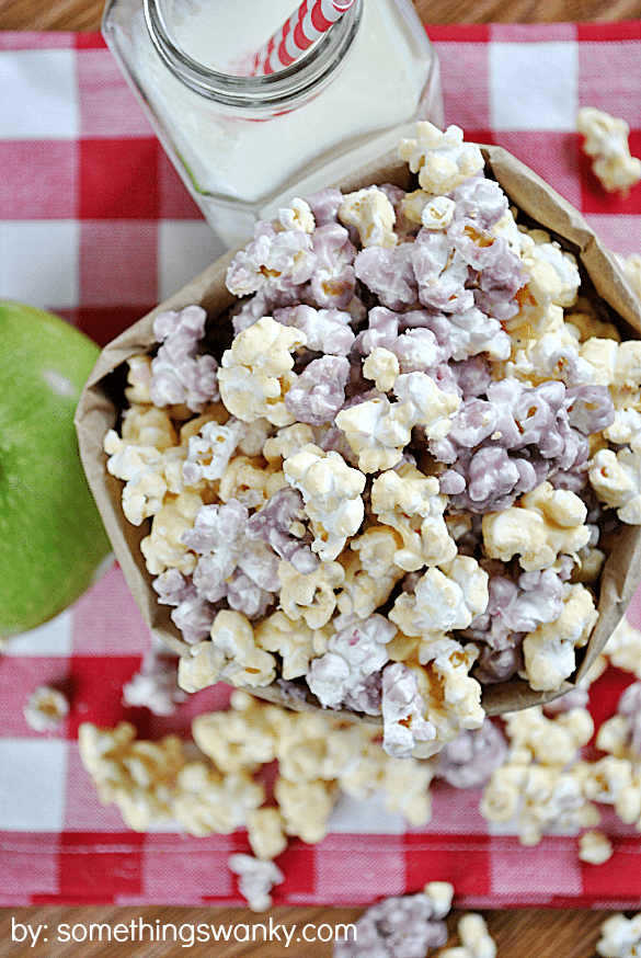 Peanut Butter Jelly Popcorn - One of over 20 delicious peanut butter and jelly recipes for Peanut Butter Jelly Time on A Family Feast