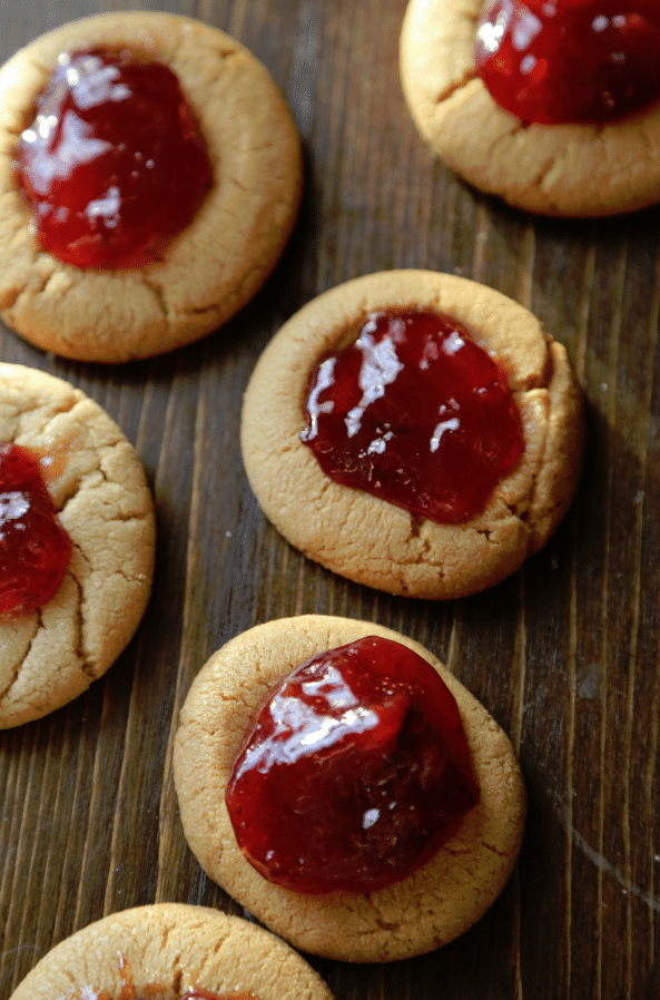 Peanut Butter and Jelly Thumbprint Cookies - One of over 20 delicious peanut butter and jelly recipes for Peanut Butter Jelly Time on A Family Feast