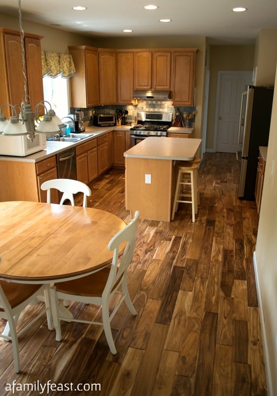 See the progress we've made with our Kitchen Makeover. The New Hardwood Floors in our kitchen have transformed the room!