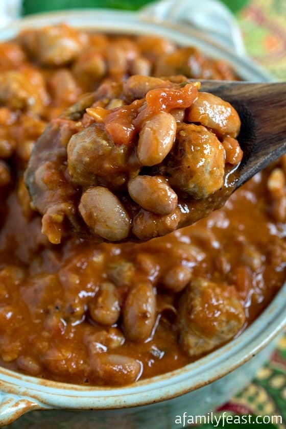 Tuscan-Style Beans - Also called Fagioli All’Uccelletto. Tender beans in a flavorful sauce made with tomatoes, sage and Italian sausage. So good!