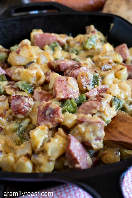 Cheesy Smoked Sausage Skillet - Dinner is ready in just 30 minutes! This easy weeknight meal is one that your entire family will love!