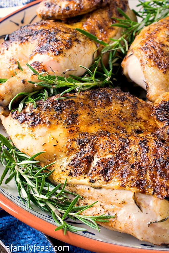 Roasted Chicken with Rosemary Compound Butter - A super flavorful, tender and juicy roast chicken recipe.