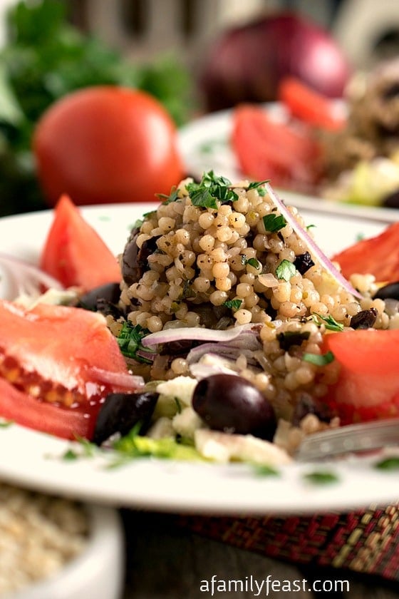 Mediterranean Israeli Couscous Salad - A zesty hot-cold salad with fantastic flavor. This looks fancy but is super simple to make!