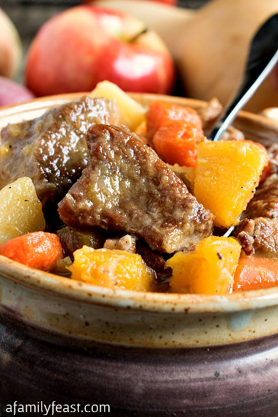 Autumn Pork Stew - Tender chunks of pork, apples, potatoes and butternut squash are combined to create the ultimate comfort food!