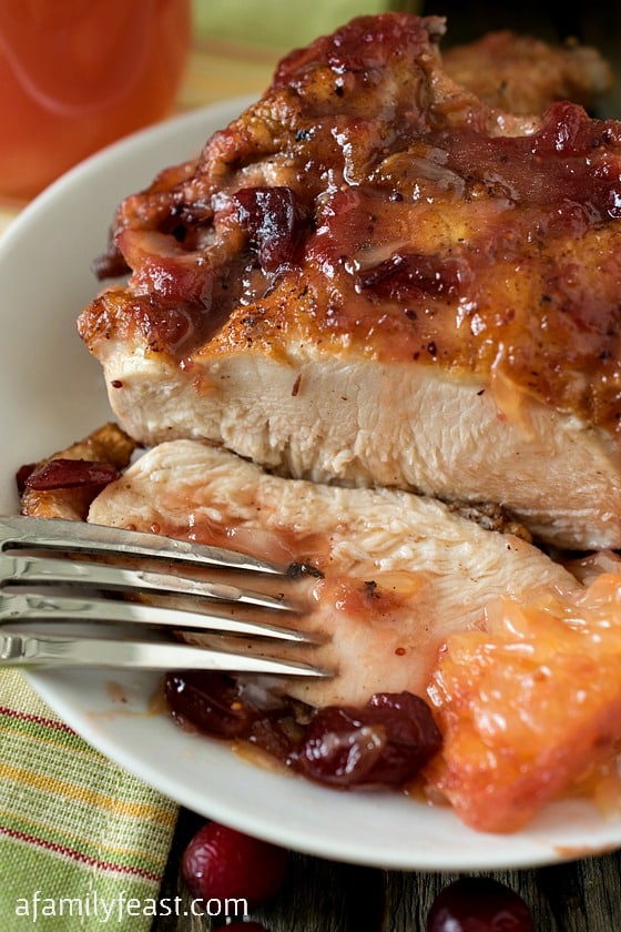 Ruby Red Grapefruit and Cranberry Chicken - Tender juicy chicken with a sweet-tart sauce. This chicken is fantastic and a great way to enjoy in-season cranberries.
