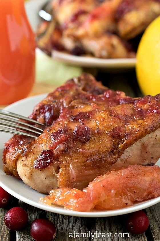 Ruby Red Grapefruit and Cranberry Chicken - Tender juicy chicken with a sweet-tart sauce. This chicken is fantastic and a great way to enjoy in-season cranberries.