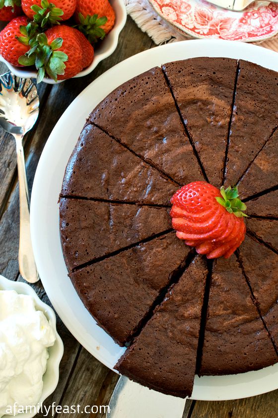 Chocolate-Bourbon Pecan Torte - A decadent, rich flourless chocolate cake made even more decadent with bourbon added! Crazy rich and delicious!