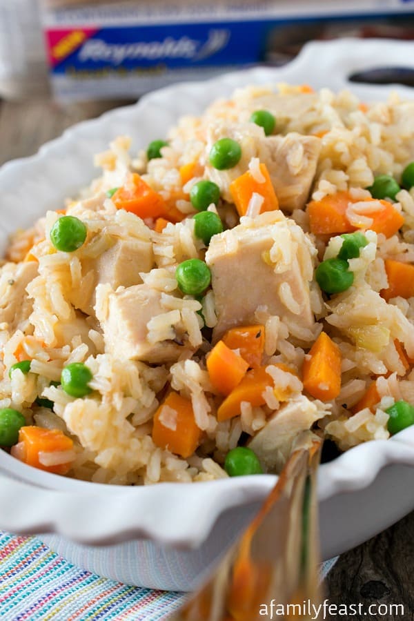 Dinner is ready in just 30 minutes with this Easy Chicken & Rice!  Makes a big batch - perfect for leftovers the next day!