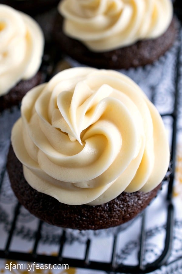 Boozy Guinness Cupcakes - Chocolate and Guinness cupcakes filled with a Kahlua ganache and topped with Bailey's Irish Cream frosting! 