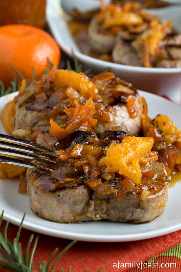 Mandarin Pork Tenderloin Medallions - The perfect sweet and savory pairing of pork with a Mandarin orange, Dijon, rosemary glaze. Only 30 minutes to make this elegant meal!