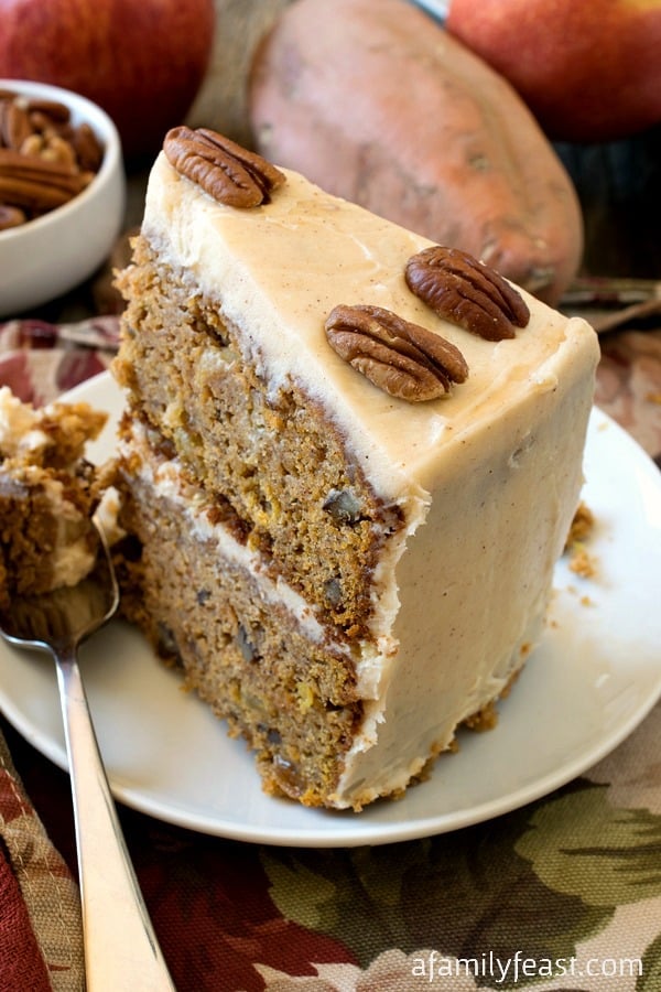 Sweet Potato and Apple Cake - A super moist and delicious cake filled with nuts and raisins in a cake batter of sweet potato and apples. Superb!