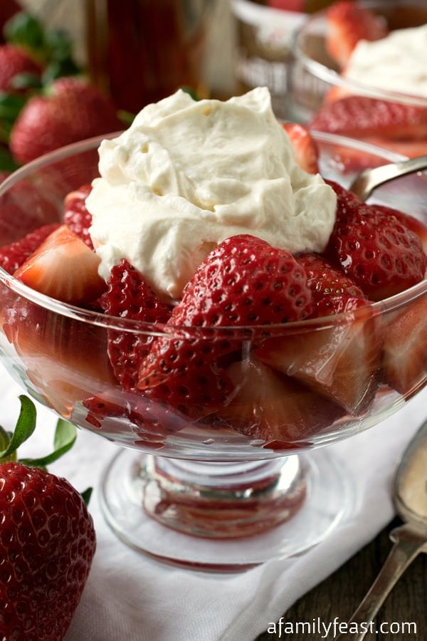 Strawberries Romanoff - A must-try, luxuriously delicious dessert of fresh strawberries, whipped cream and sour cream that have been flavored with liqueur. 