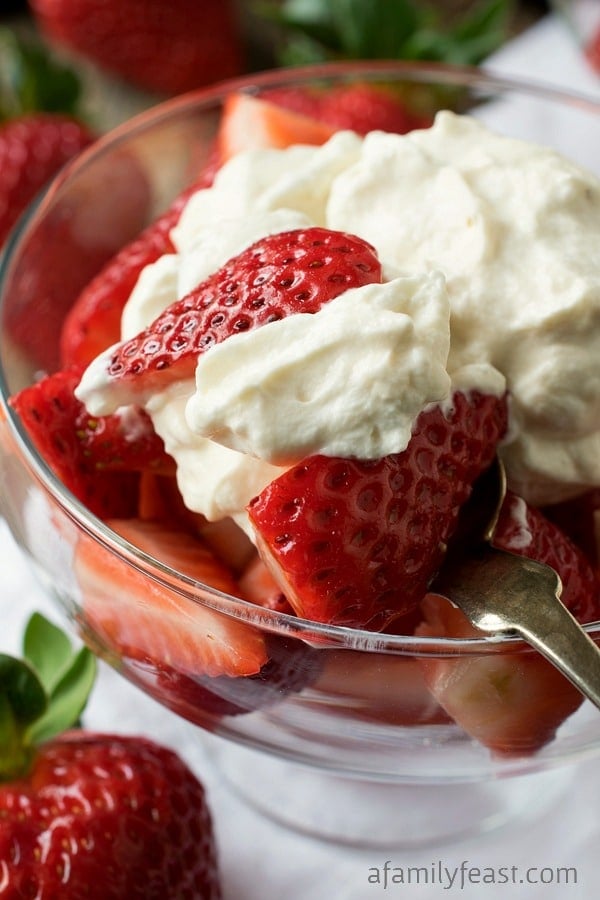 Strawberries Romanoff - A must-try, luxuriously delicious dessert of fresh strawberries, whipped cream and sour cream that have been flavored with liqueur. 