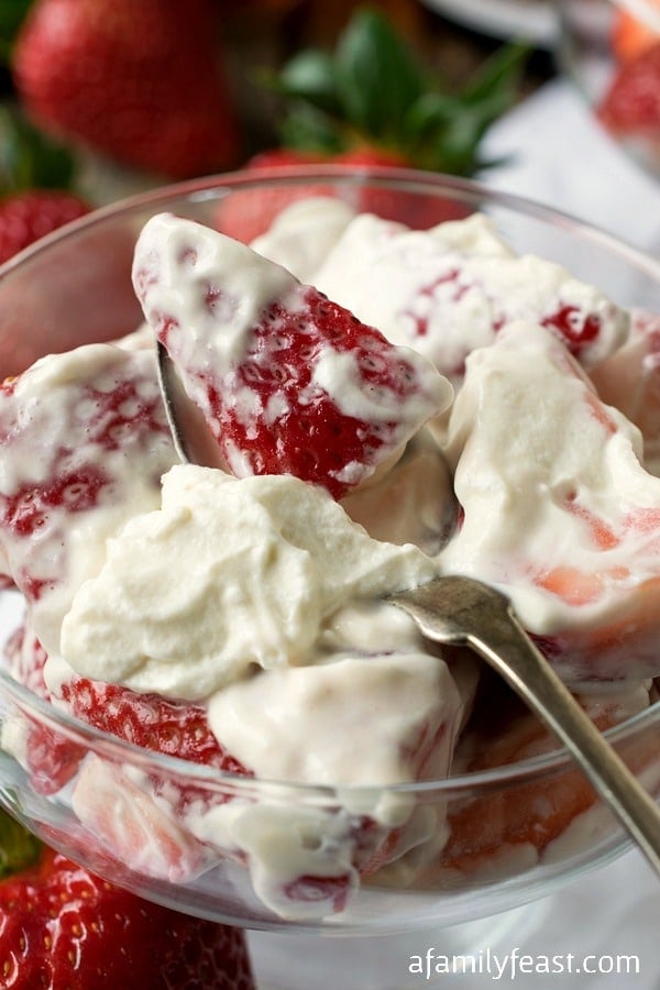 Strawberries Romanoff - A must-try, luxuriously delicious dessert of fresh strawberries, whipped cream and sour cream that have been flavored with liqueur. 