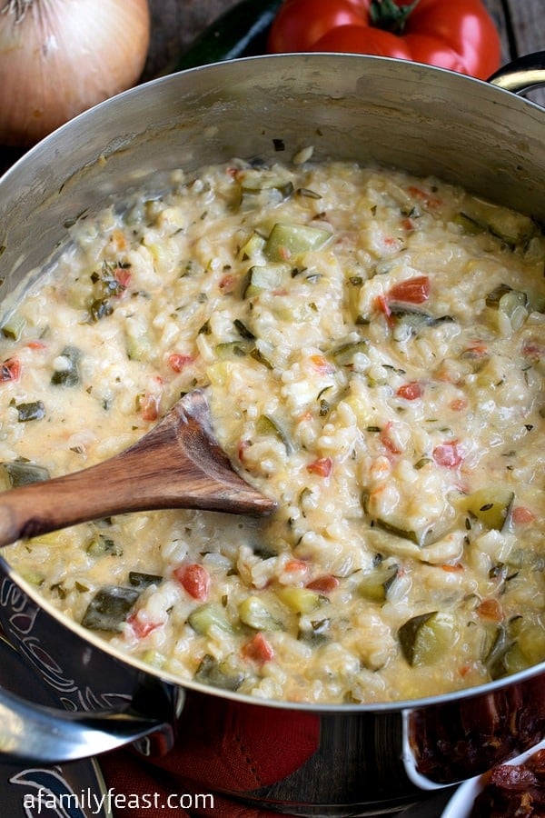 Zucchini Risotto with Goat Cheese and Prosciutto - A fantastic risotto that gets an extra kick of flavor from melted goat cheese stirred in at the end. Plus crispy prosciutto on top!