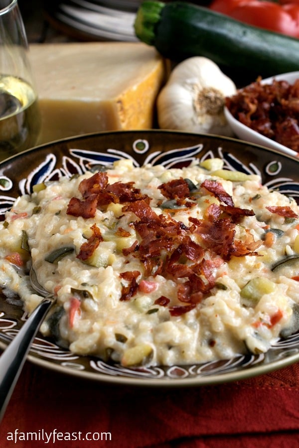 Zucchini Risotto with Goat Cheese and Prosciutto - A fantastic risotto that gets an extra kick of flavor from melted goat cheese stirred in at the end. Plus crispy prosciutto on top!