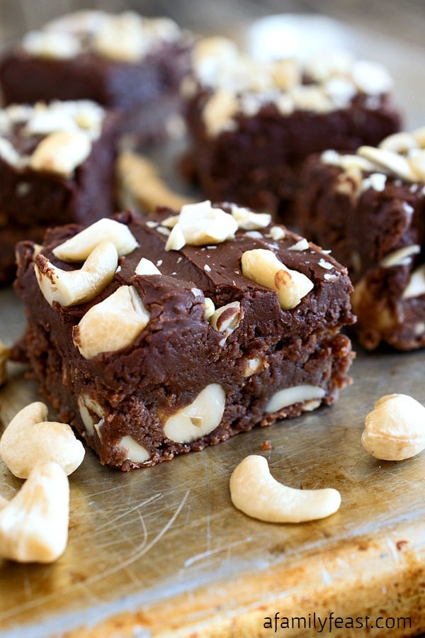 Cashew Frosted Brownies - Decadently delicious, fudgy and dense chocolate frosted brownies loaded cashews!