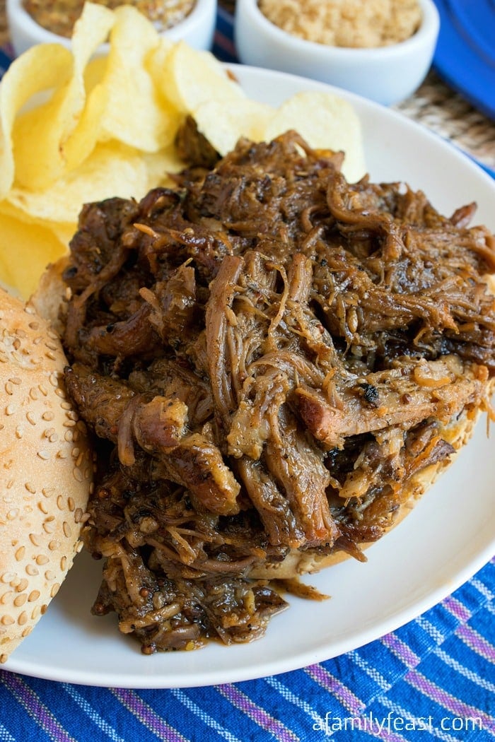 Beer Braised Barbecue Pork Butt - A super flavorful recipe for fork-tender braised pork butt. So delicious!