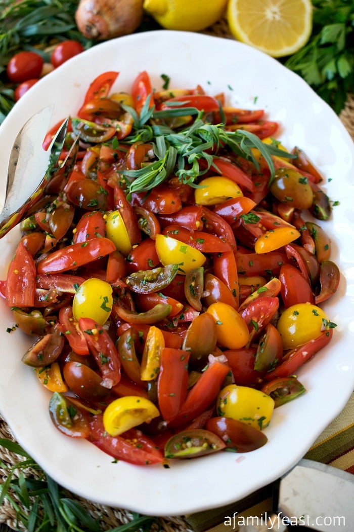 Herbed Tomatoes - A mix of fresh herbs transforms the flavor of cherry tomatoes in this easy summer side dish!