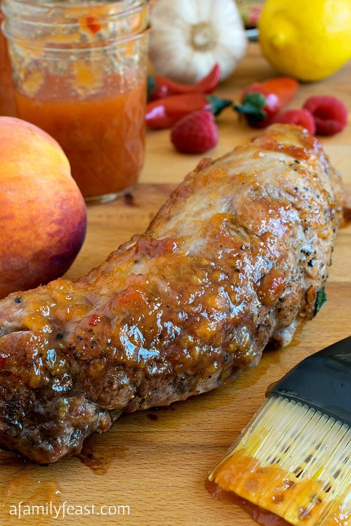 Peppery Peach Glazed Pork Tenderloin - A simple, flavorful meal any day of the week! Also perfect for serving at a dinner party.