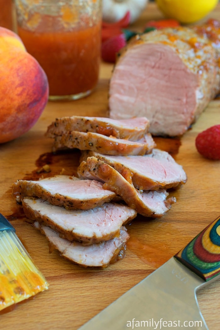 Peppery Peach Glazed Pork Tenderloin - A simple, flavorful meal any day of the week! Also perfect for serving at a dinner party.