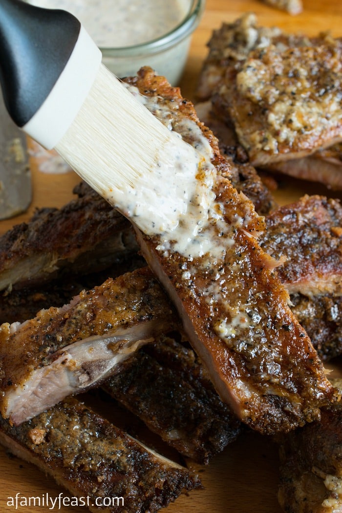 White Barbecue Sauce Pork Ribs - A delicious change from the same old barbecued ribs! This zesty, peppery white sauce is fantastic on ribs!