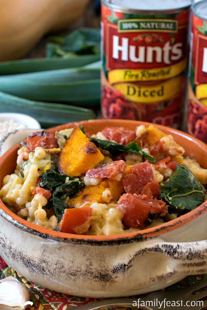 Fire Roasted Tomato and Barley Risotto - A creamy barley risotto loaded with fire roasted tomatoes, butternut squash and kale. Super comforting and delicious!