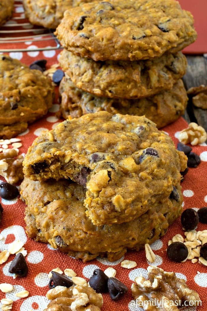 Pumpkin Oatmeal Chocolate Chip Cookies - Giant, tender cookies loaded with pumpkin, oats, chocolate chips and walnuts! Incredible!