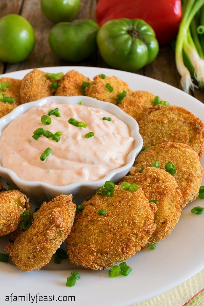 Fried Green Tomatoes with a creamy, zesty dipping sauce. Perfect for cooking with end-of-garden green tomatoes!