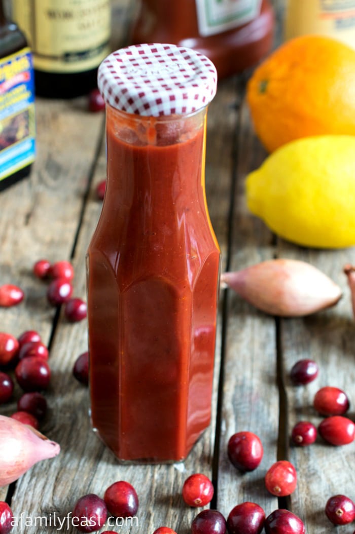 Cranberry Barbecue Sauce - This smoky, tart and sweet sauce is fantastic on pizza or meats. Made with a fresh or frozen cranberries.