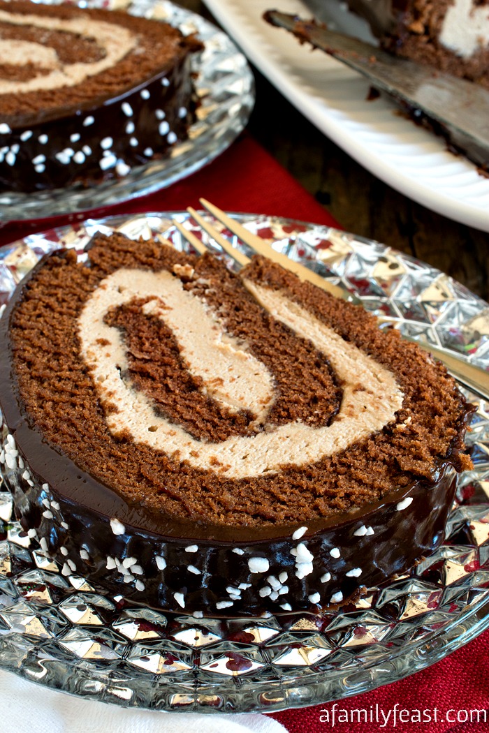 Malted Mocha Swiss Roll - Not your typical chocolate Swiss roll cake! Ours is filled with a malted espresso cream that is out of this world!