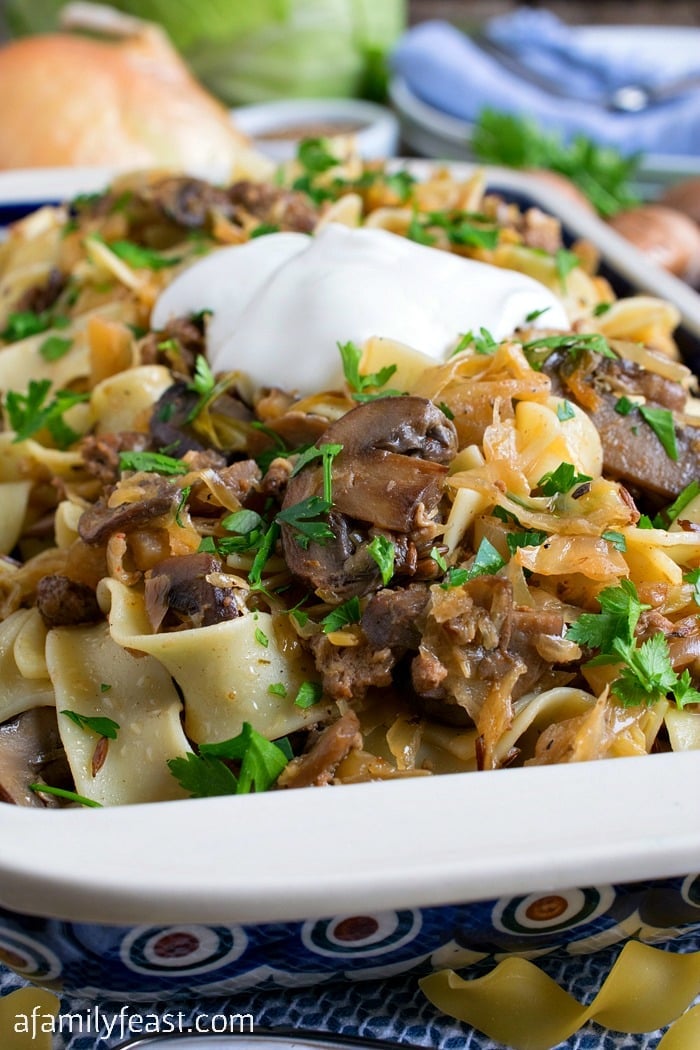 Lazanki with Mushrooms and Beef - Noodles tossed with sauteed ground beef, mushrooms, and sauerkraut and topped with sour cream. A classic Polish dish.
