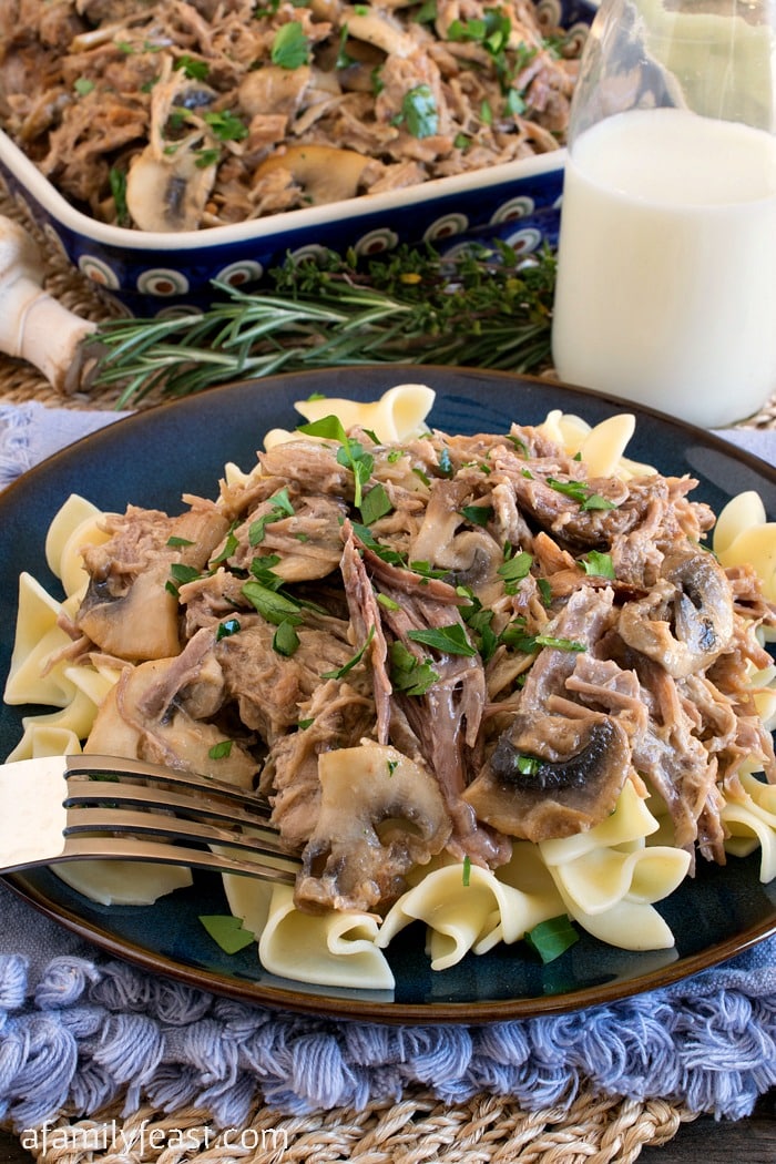 Milk Braised Pulled Pork with Mushrooms - Tender and delicious pulled pork in an incredible milk-based sauce.