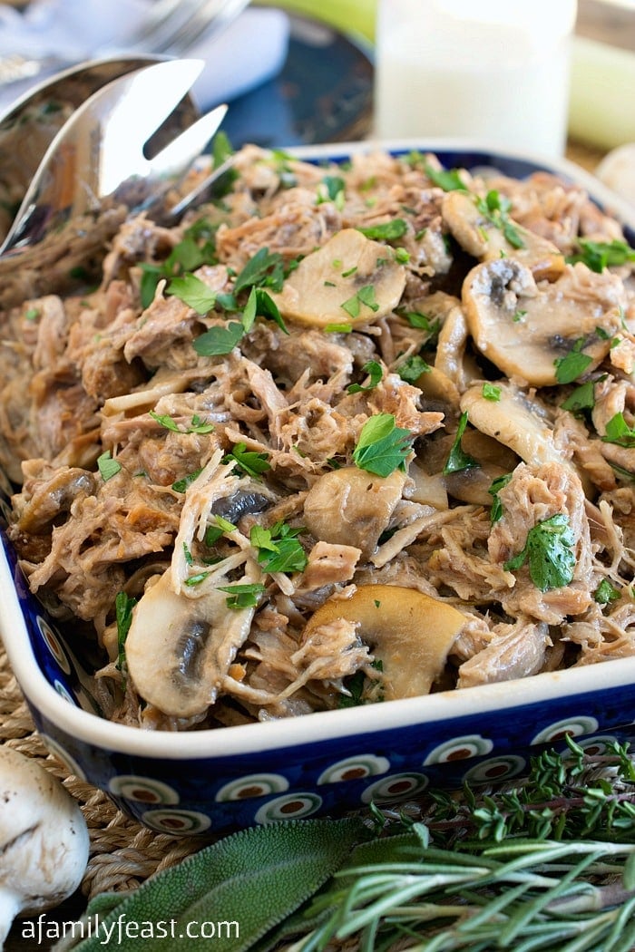 Milk Braised Pulled Pork with Mushrooms - Tender and delicious pulled pork in an incredible milk-based sauce.