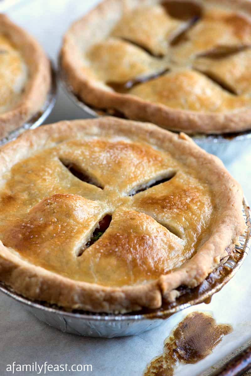 Individual Beef Pot Pies - Make up a batch of these hearty beef pot pies and bake right away or freeze to eat later! Delicious time saving recipe!