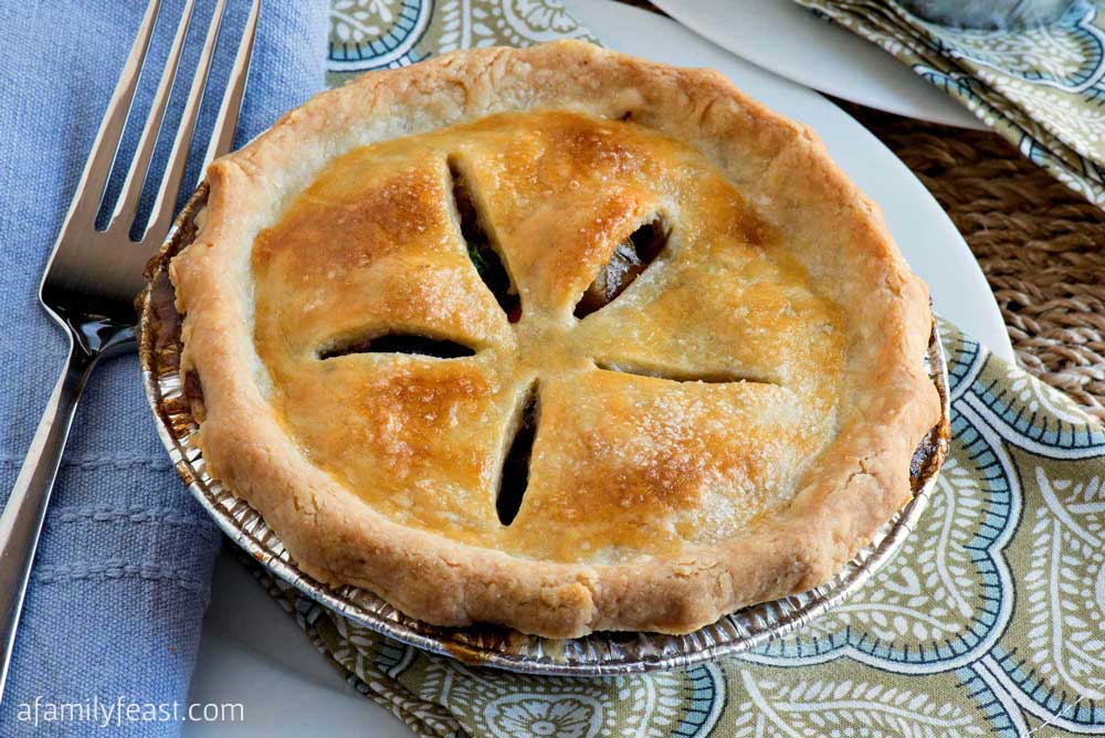 Individual Beef Pot Pies - Make up a batch of these hearty beef pot pies and bake right away or freeze to eat later! Delicious time saving recipe!