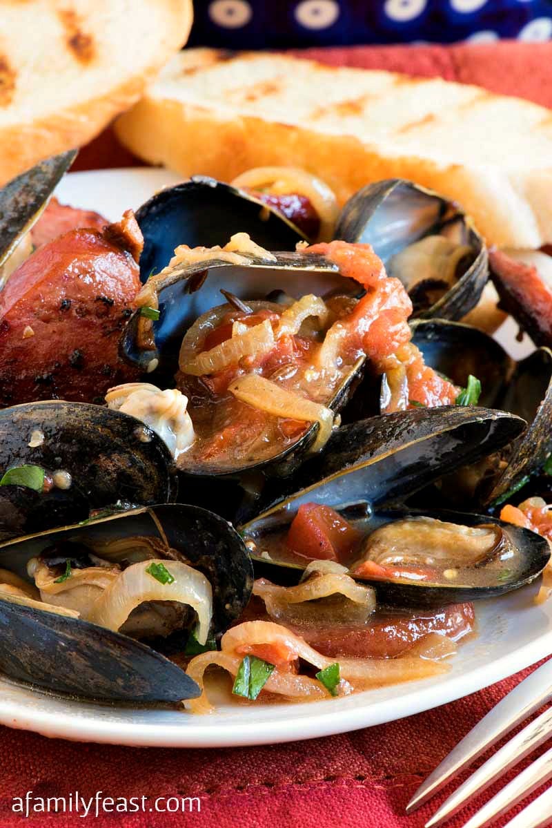 Polish-Style Steamed PEI Mussels - Fresh steamed PEI mussels together with fried kielbasa, shallots, mustard and caraway seed. #PEIMusselsOnTheMenu