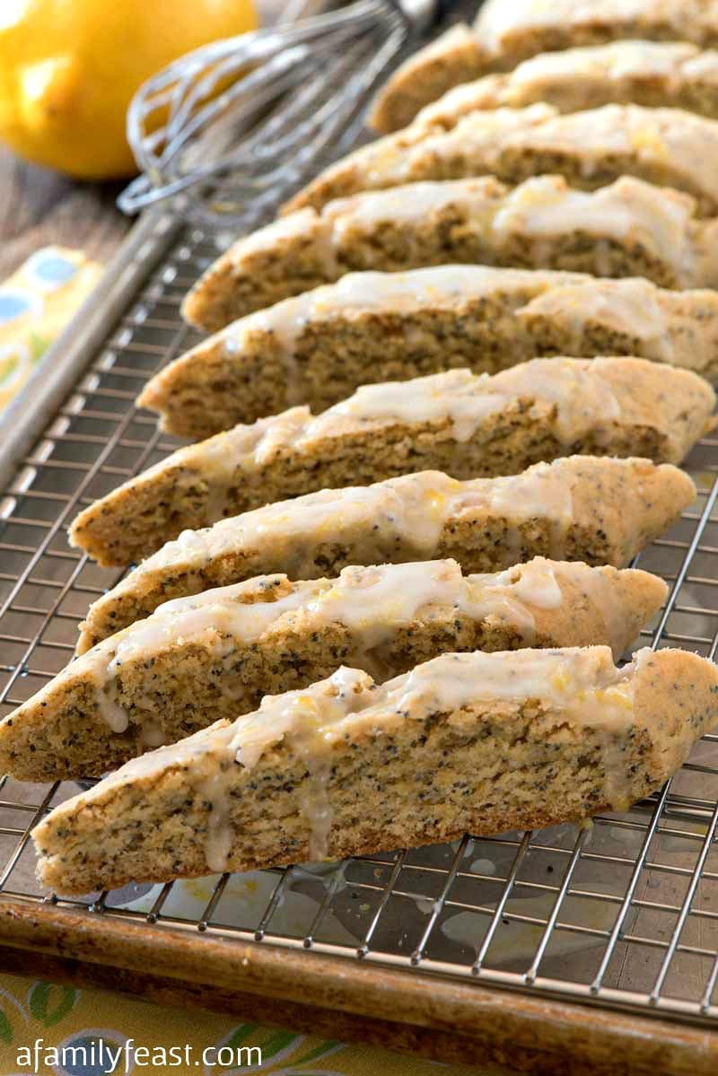 Lemon Ginger Poppy Seed Biscotti - Lemon poppy seed biscotti with bits of crystallized ginger and fresh lemon zest. So delicious!
