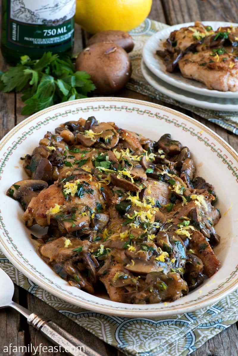 Chicken Thighs with Mushrooms, Lemon and Herbs recipe - perfect for a quick weeknight meal at home but so delicious, you’ll think you are eating at a gourmet restaurant.