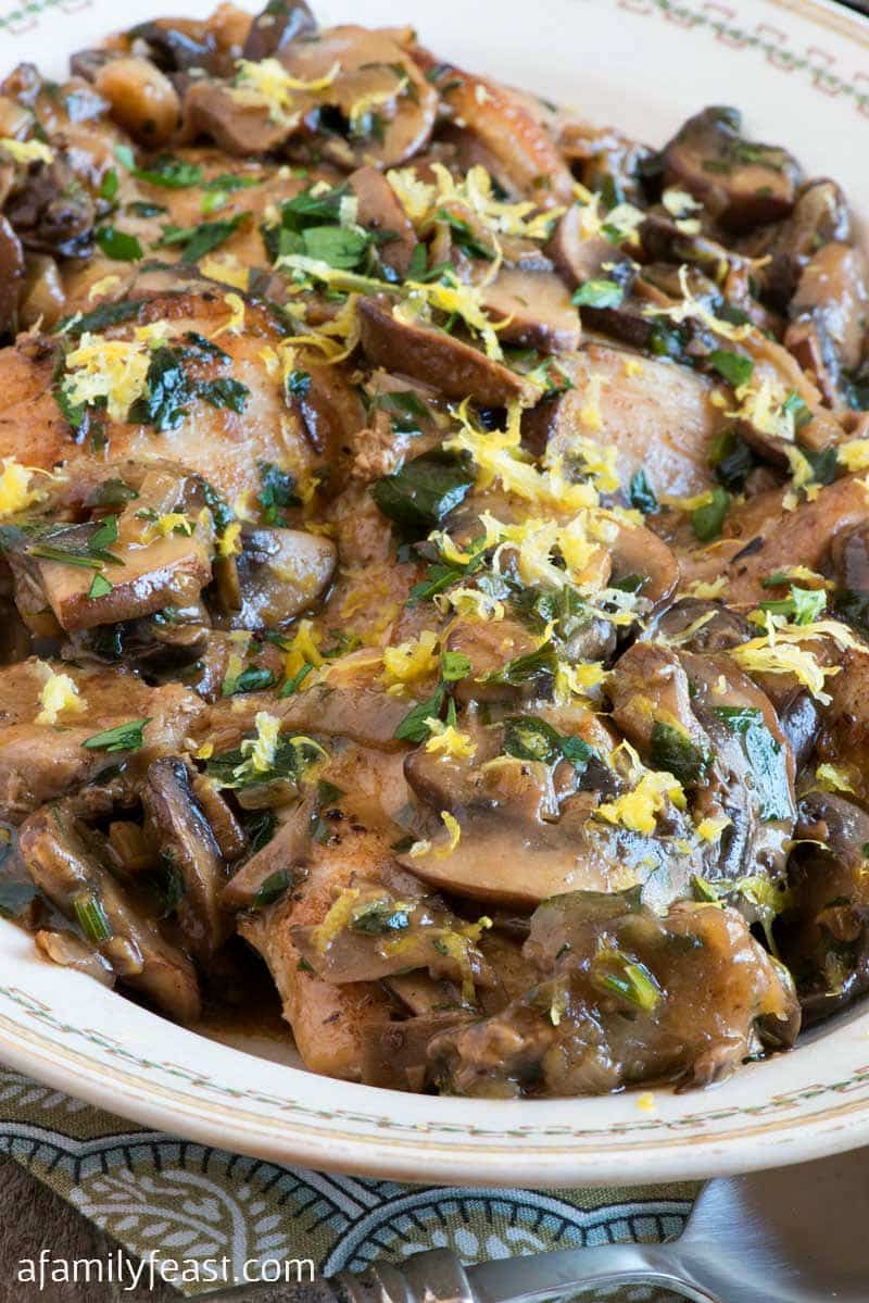 Chicken Thighs with Mushrooms, Lemon and Herbs recipe - perfect for a quick weeknight meal at home but so delicious, you’ll think you are eating at a gourmet restaurant.