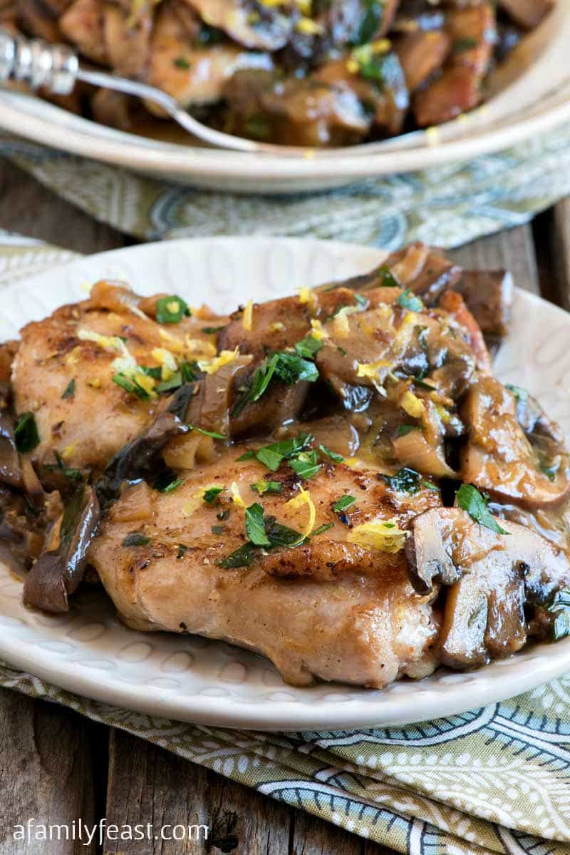 Chicken Thighs with Mushrooms, Lemon and Herbs recipe - perfect for a quick weeknight meal at home but so delicious, you’ll think you are eating at a gourmet restaurant.