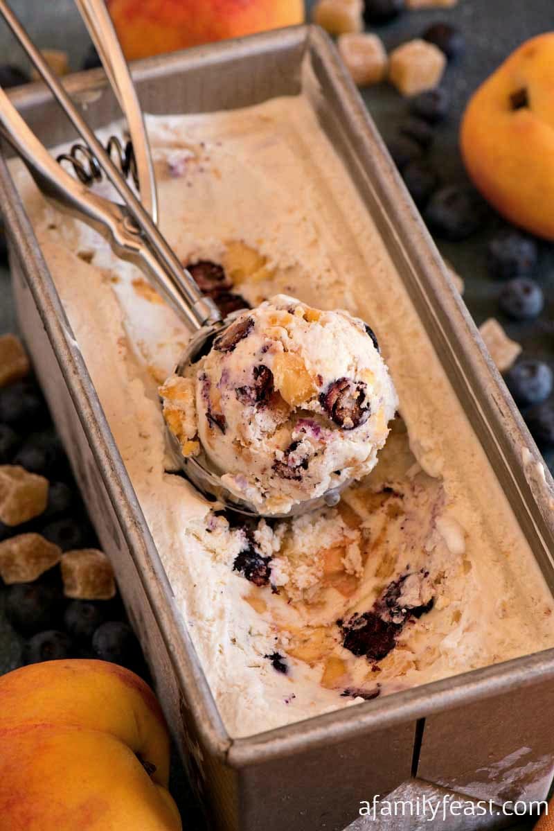 Ice cream with peaches and blueberries and ginger